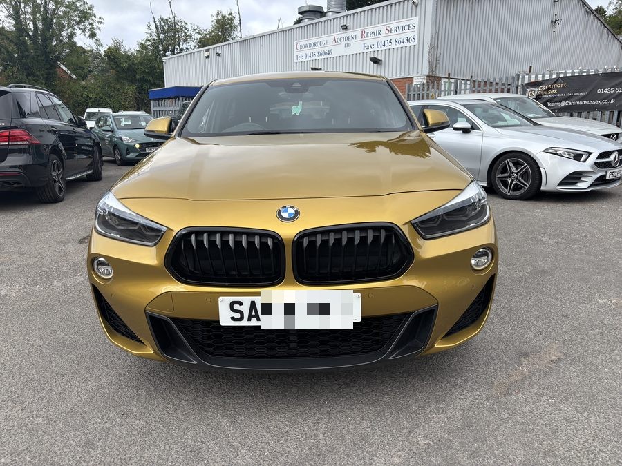 Gold BMW X2 after bodywork repair at Crowborough Accident Repair Services